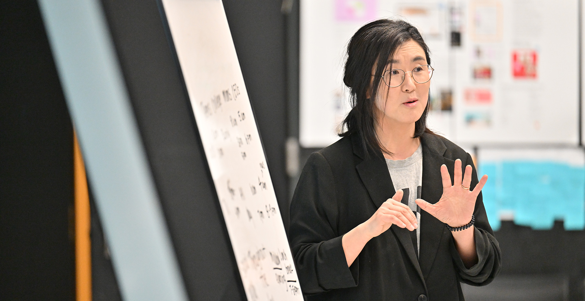 instructor teaching near a whiteboard