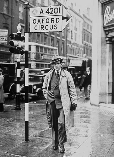 Edward R. Murrow walking down the street