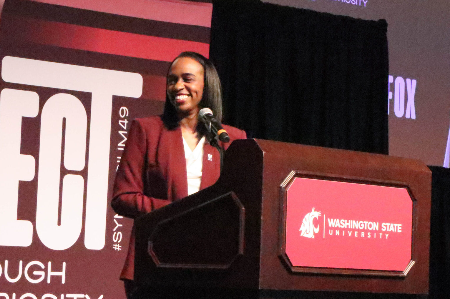 Jaimee L Fox speaking at the Murrow Symposium