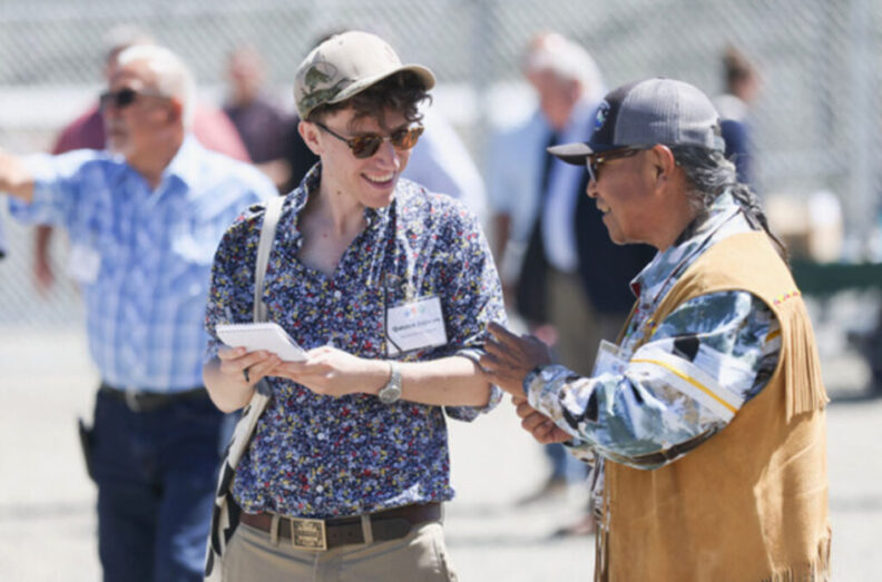 Image of reporter talking to citizen