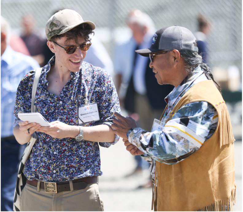 Journalist talking with tribal chief