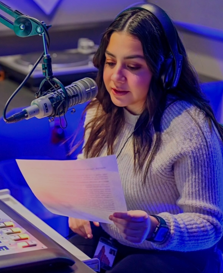 Monica at the microphone