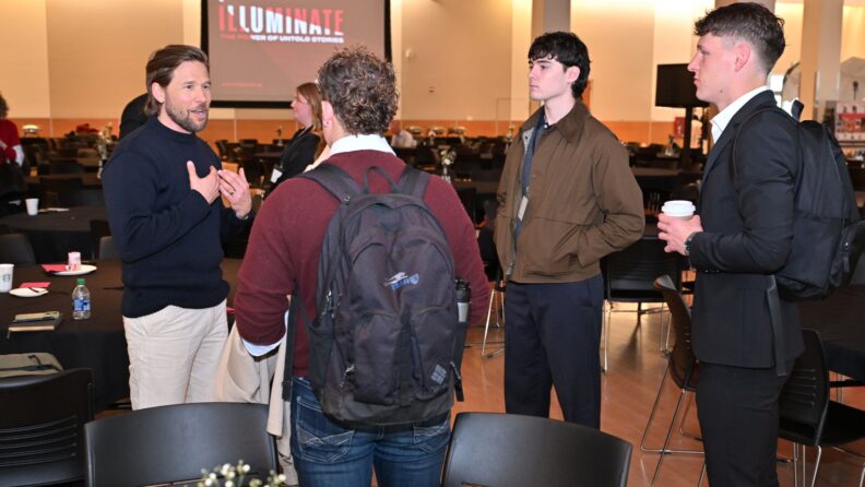 Doug Thielen talking to students