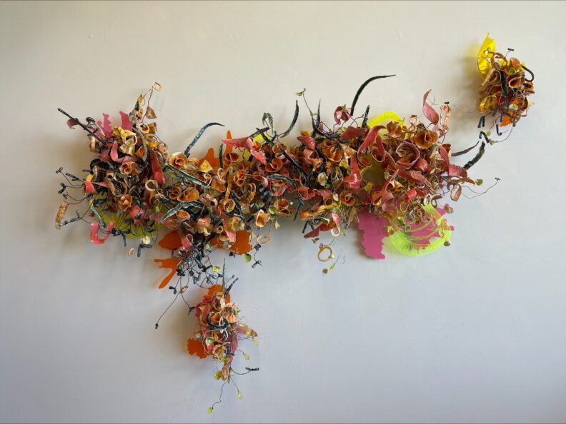 sculptural artwork made with fired clay ,wite, underglazes, glazes , laser cut plexiglass , wood, metal brace