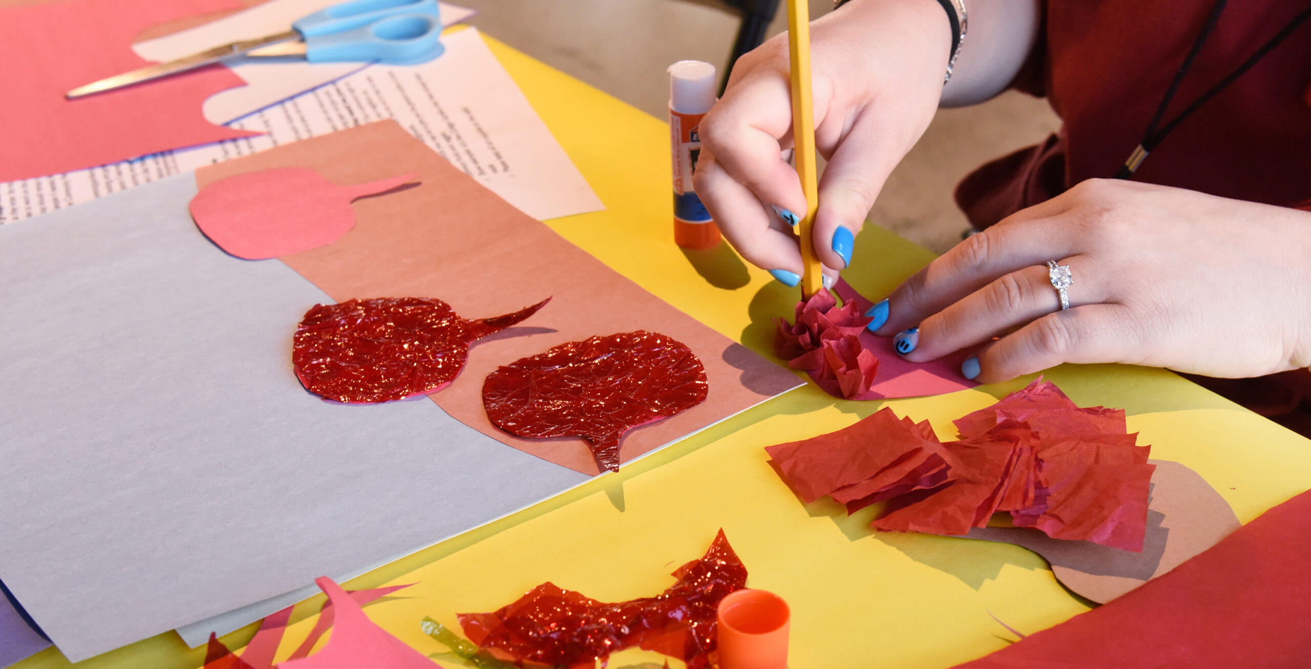 Collage Garden art activity: Hands making beets out of paper