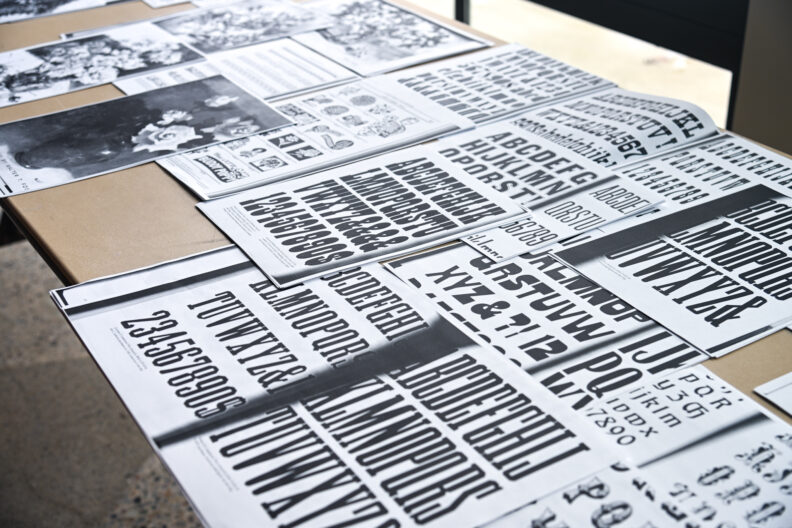 Image of tables with art supplies for making love letter zines