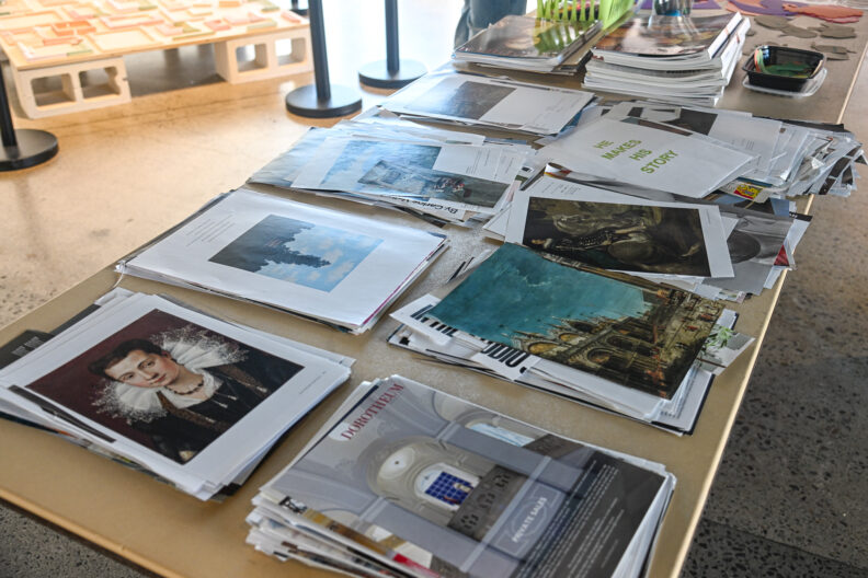 image of a table full of materials for making collages