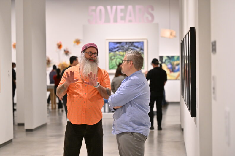 Image of museum visitors enjoying the Faculty Remix Exhibition Reception on 01/16/25