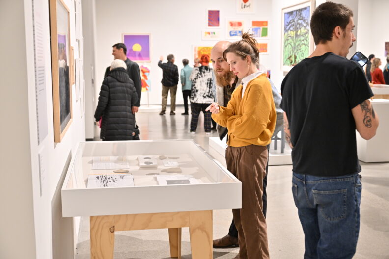 Image of museum visitors enjoying the Faculty Remix Exhibition Reception on 01/16/25