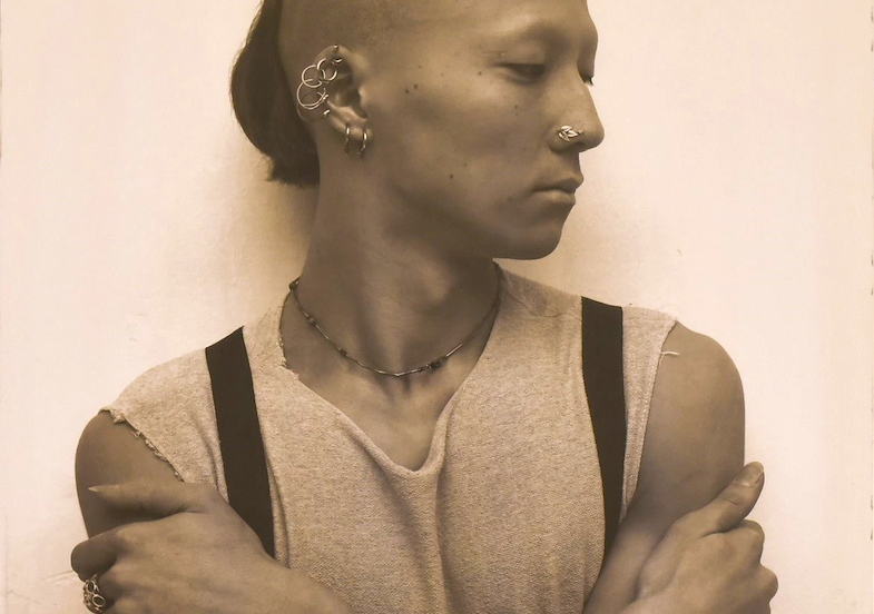 Portrait of person with arms crossed