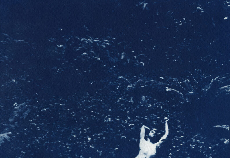 Man reclining in blue
