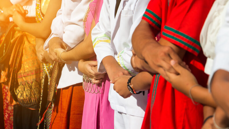 Symbol of shaking hands together for ASEAN Day,selective focus