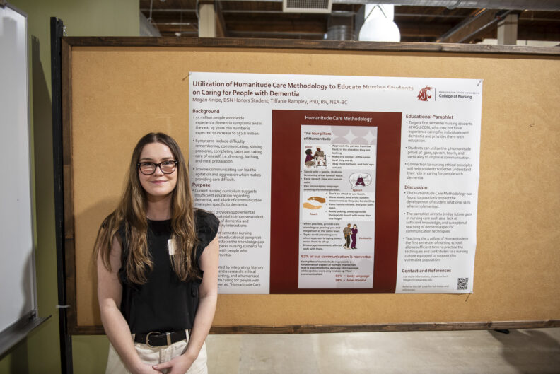 Nursing honors student, Meagan Knipe '25, with research poster