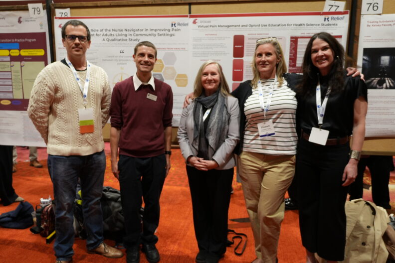 Dr. Wilson (center), pictured with the RELIEF team, consisting of Mike Coriasco, MNE RN, Ross Bindler, PharmD, Beth Feustel, BSN, MHP, RN, and Fionnuala Brown, DNP, MSN, FNP-C, RN.
