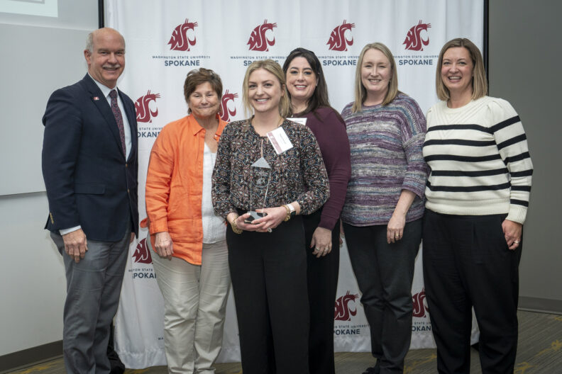 Chancellor Daryll DeWald, Dean Mary Koithan, Taylor Kensel, Director of Development, Danielle Desormier, Director of Finance and Administrative Services, Anne Mason, Associate Dean of Academic Affairs, and Alicia Preston, Operations Manager at the 2025 Chancellor's Excellence Awards.