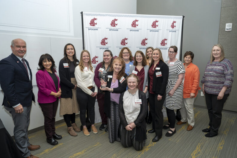 Chancellor Daryll DeWald with the College of Nursing Center for Experiential Learning staff and faculty, Dean Mary Koithan, and Anne Mason, Associate Dean of Academic Affairs at the 2025 Chancellor's Excellence Awards.