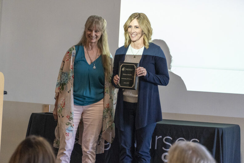 Outstanding DNP Student award presented to Theresa Bowden by Bobbi Bennett-Wolcott