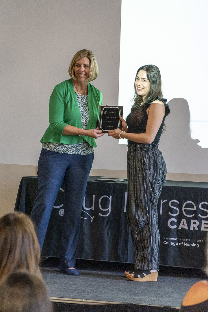 Inclusive Excellence award presented to Liana Elmaliah by Dr. Tiffanie Rampley