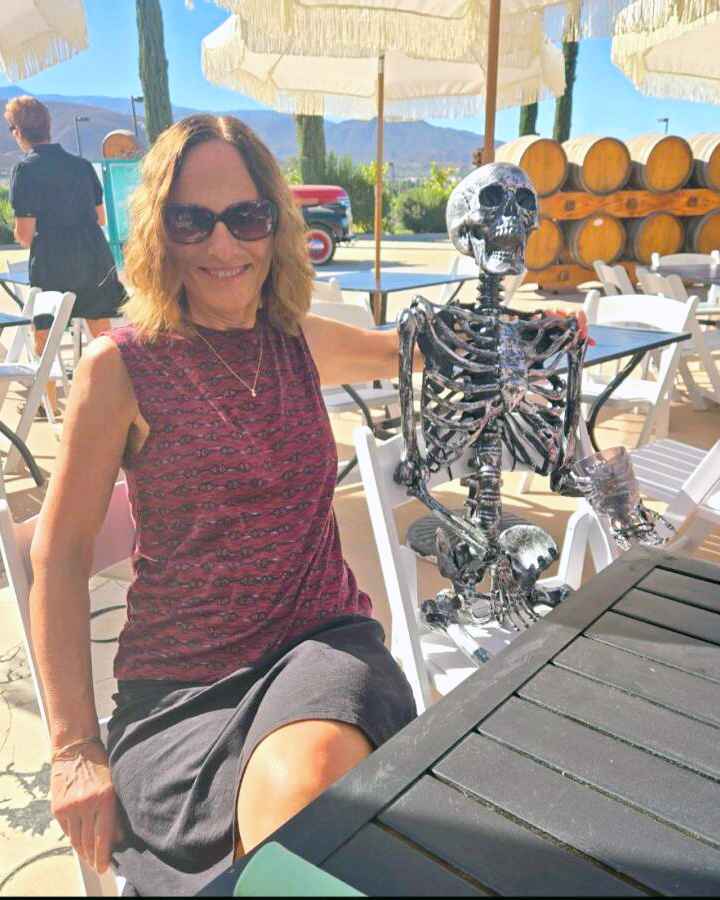 Debbie Brinker sitting at a table