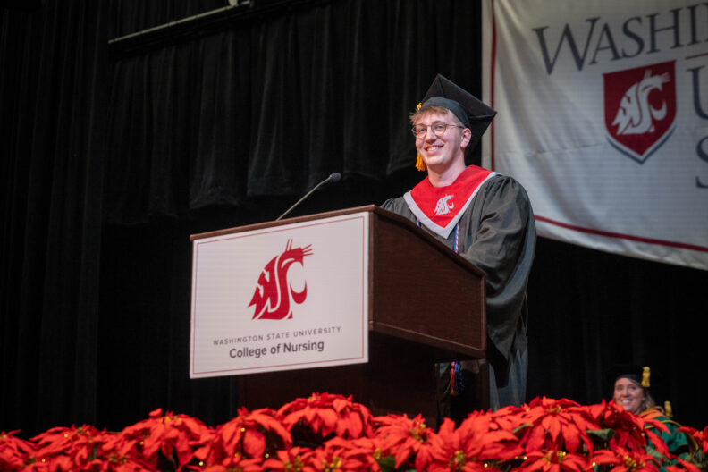 Erik Rotness, BSN '25, delivering his speech to the class of 2025 during the WSU College of Nursing graduation and pinning ceremony at Whitworth University, Spokane, WA.