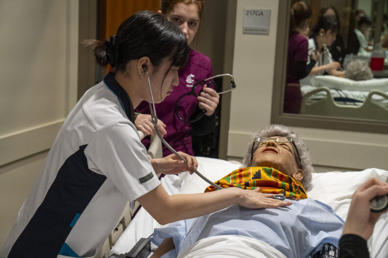 Iwate students learning about simulation in the WSU College of Nursing Center for Experiential Learning.