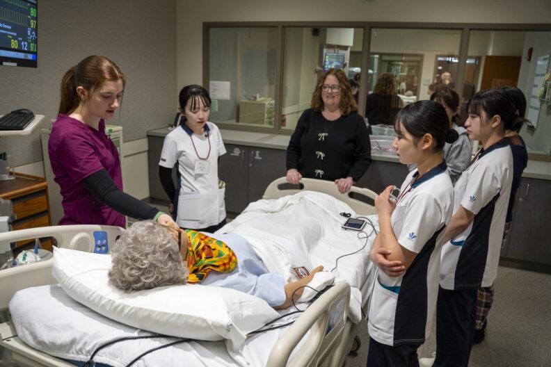Iwate students learning about simulation in the WSU College of Nursing Center for Experiential Learning.