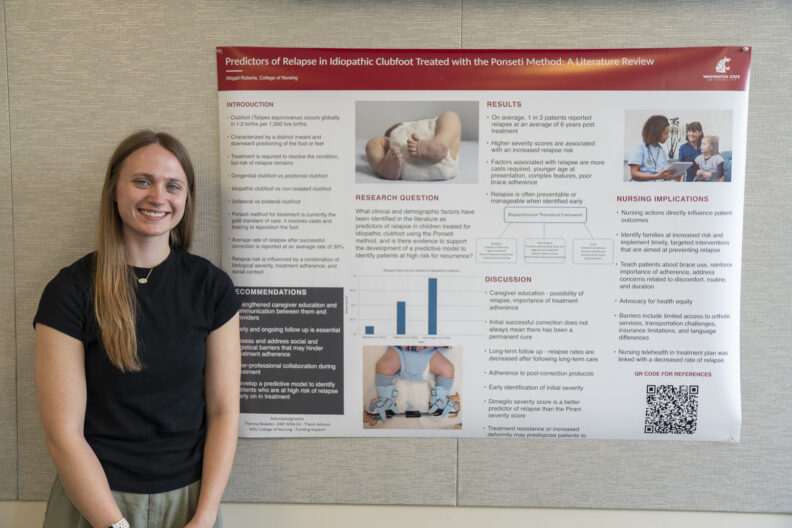 Abigail Roberts, BSN ’26 with her poster “Predictors of relapse in idiopathic clubfoot treated with the Ponseti method: A systematic review”.