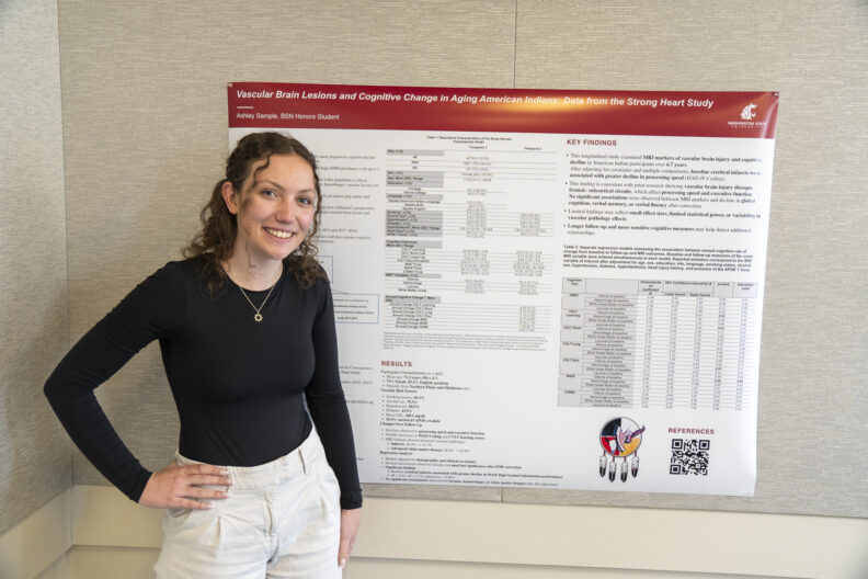 Ashley Sample, BSN ’26 with her poster “Vascular brain lesions and cognitive change in aging American Indians: Data from the Strong Heart Study”