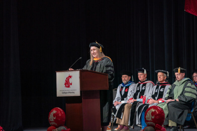 Dean Anne Mason speaking during the Spring 2026 WSU College of Nursing Spokane Commencement and Pinning Ceremony.