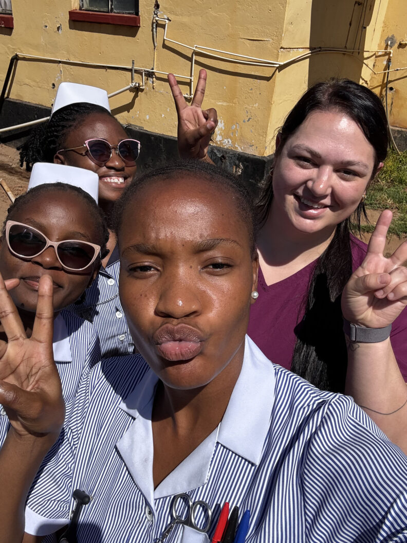 Abigail with Taonga and two other nursing students. Photo: Abigail Elliott.
