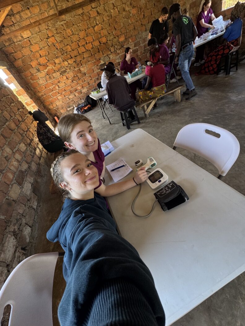 Greer and I at station 1, prepared to take vitals. Photo: Eva Gill.