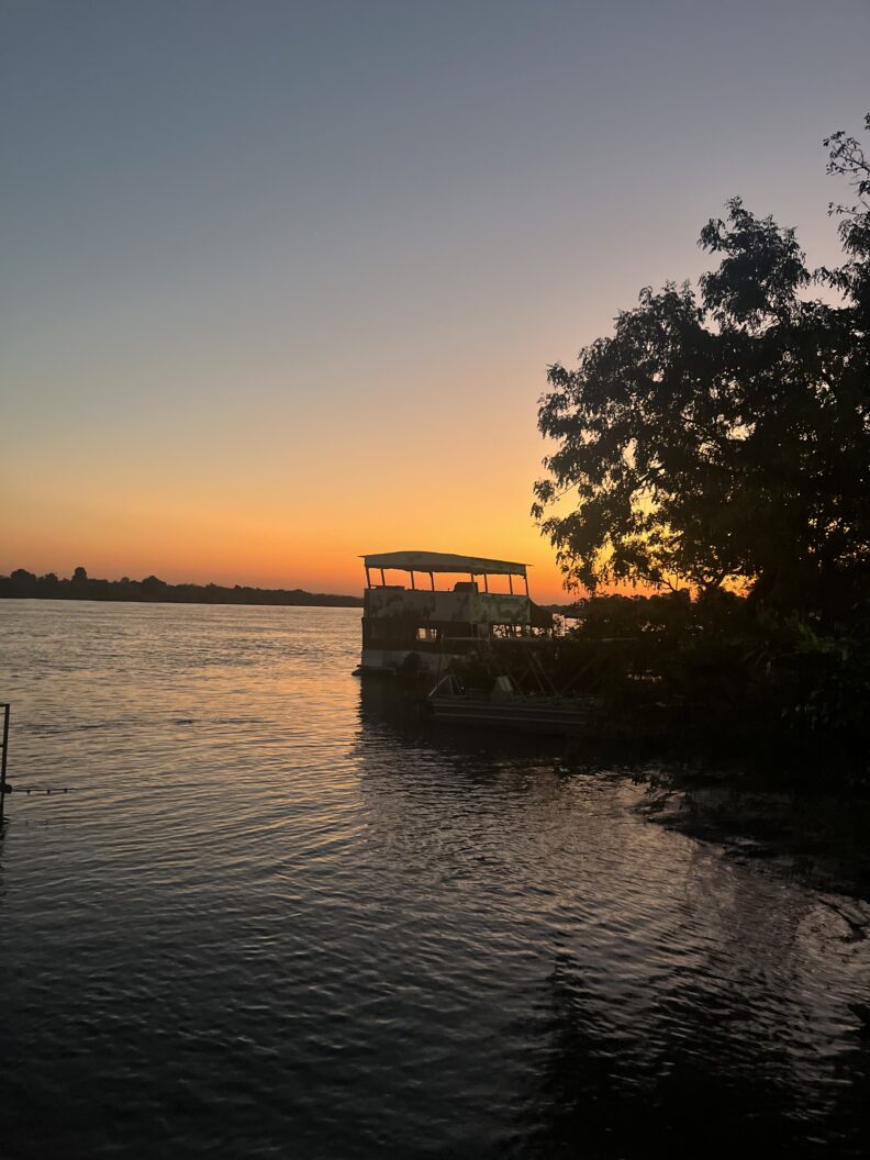 By the end of the cruise it was hard to tell whether we were watching for the river or the sky. As the sun dipped below the horizon, shades of orange and gold reflected across the water, bringing the evening to a close in spectacular fashion. It was the perfect ending to a memorable night on the Zambezi. Photo: Abdinasir Hussein.