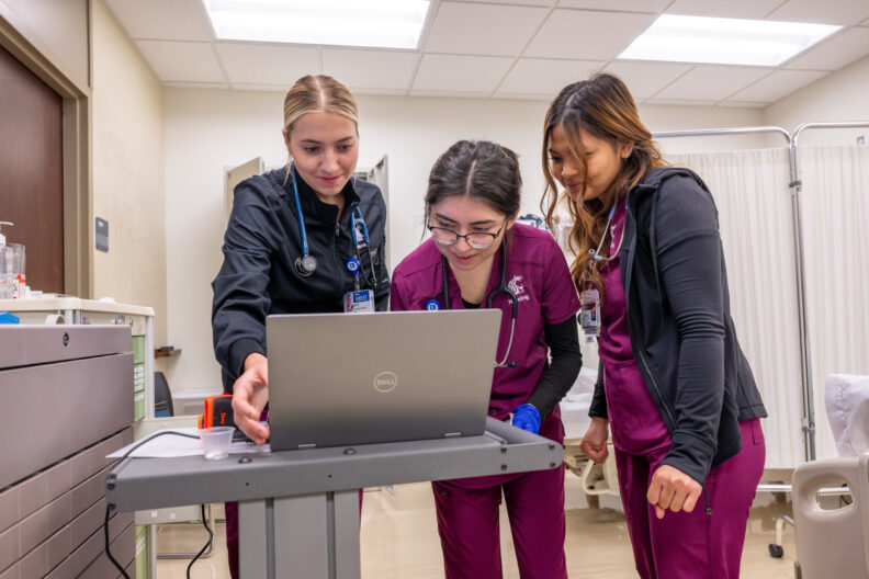 Tri-Cities BSN nursing students prepare for a simulation experience.