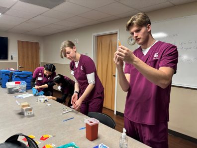 WSU nursing students prepared vaccines for an October 7 clinic at House of Charity in Spokane. From left: Amanda Justo Victoriano, Helene Oen, Lexi Manning, and Nathanael Norfleet. Students at the clinic provided 30 vaccines to 14 people in collaboration with Spokane Regional Health District. Photo: Cindy Brigham-Althoff, DNP ARNP, CNM. 