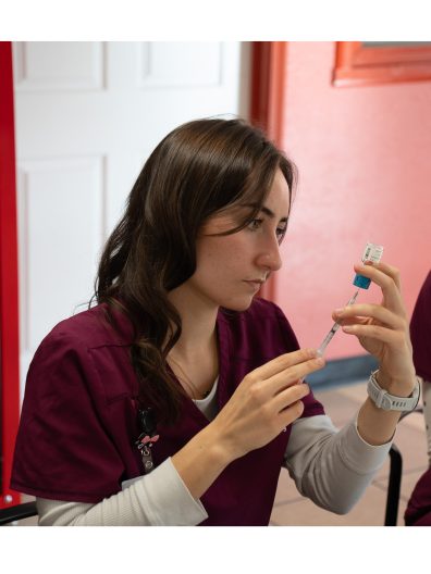 WSU College of Nursing nursing student, Esther Roeber, drawing a vaccine dose. Photo: Brad Schwartz, WSU College of Nursing.