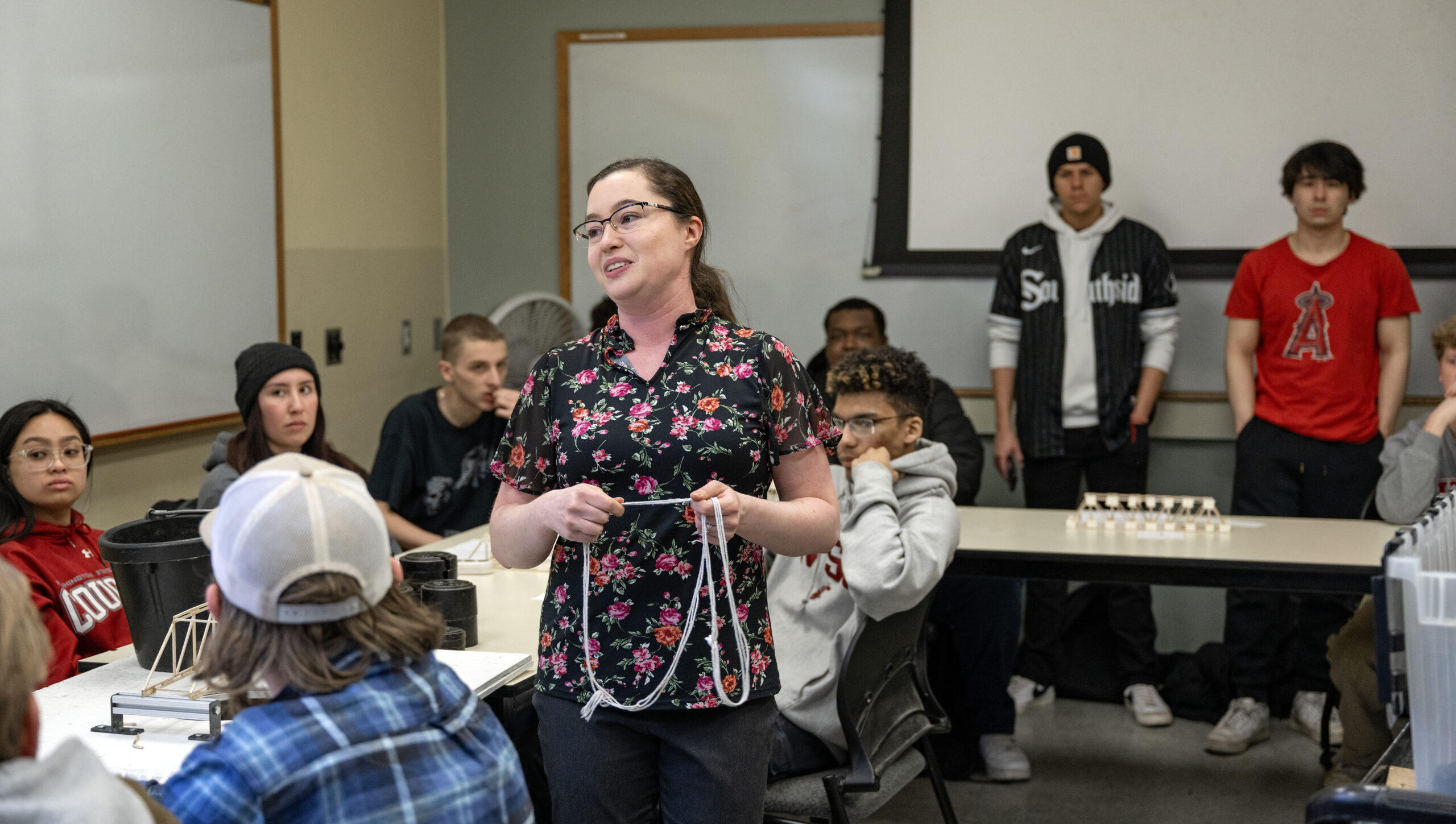 VCEA Professor Olivia Reynolds gives the rules for the balsa wood Truss testing about to take place in her lecture.