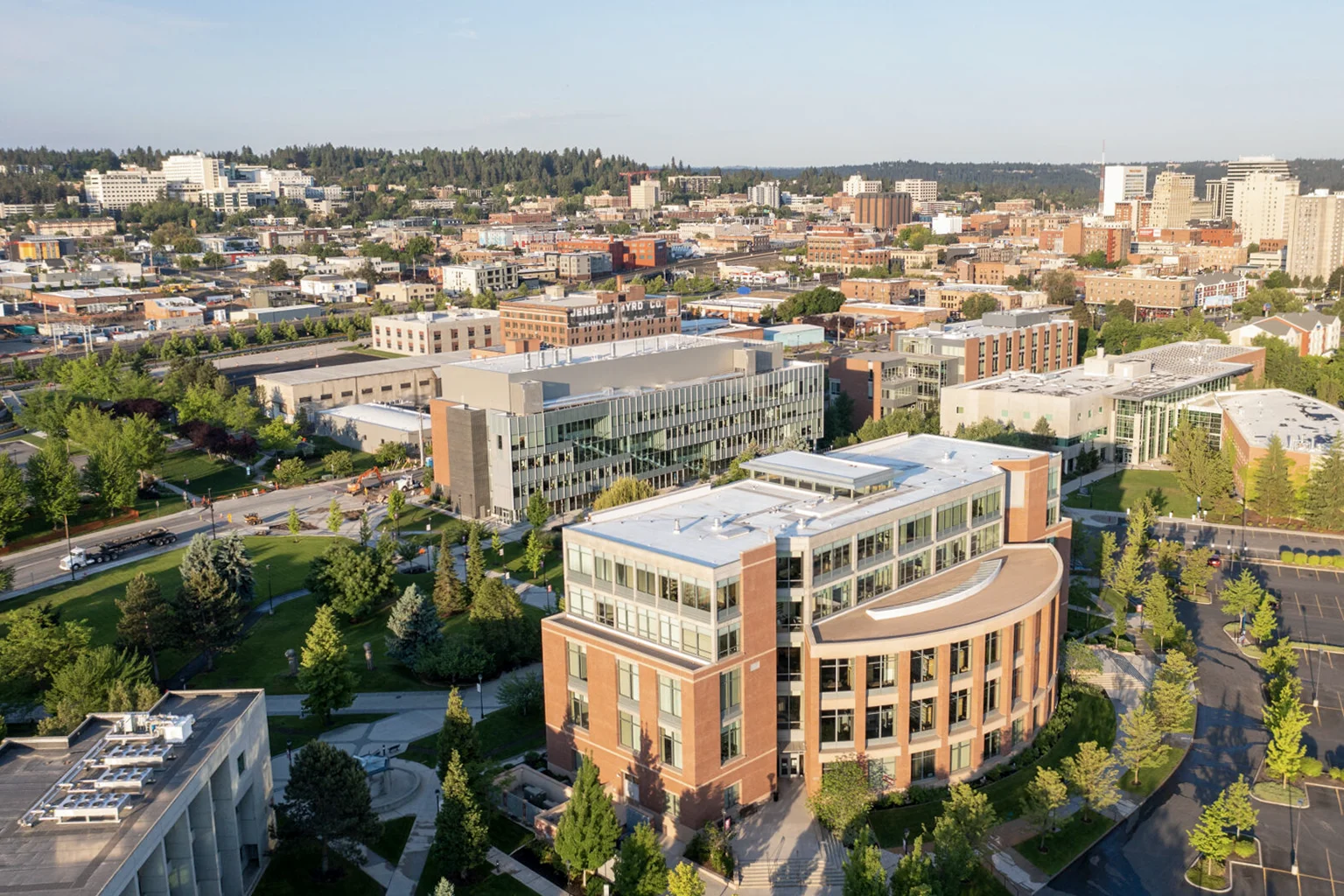 Aerial view of the WSU Spokane Campus looking southwest and down on the Health Sciences Building on a sunny day.