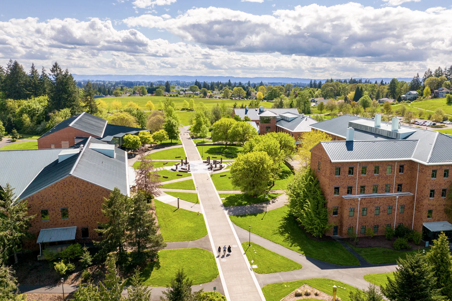 Aerial view of the WSU Vancouver campus looking southwest at the Firstenburg Family Fountain on a sunny day.