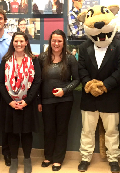 Group in front of Distinguished Scholars gallery outside Terrell Library.