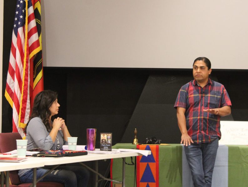 Dr. Zoe Higheagle Strong listens while Josiah Pinkham discuss research in the Nez Perce community 