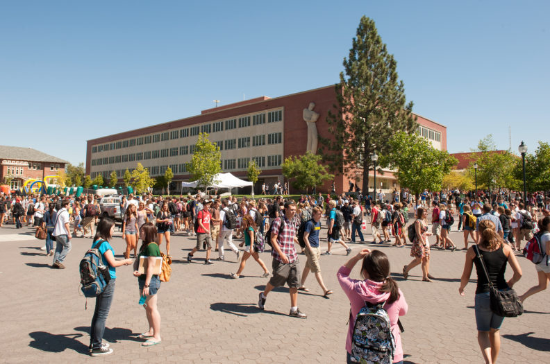 Students walk across Glenn Terrell Mall on the WSU Pullman campus during the summer.