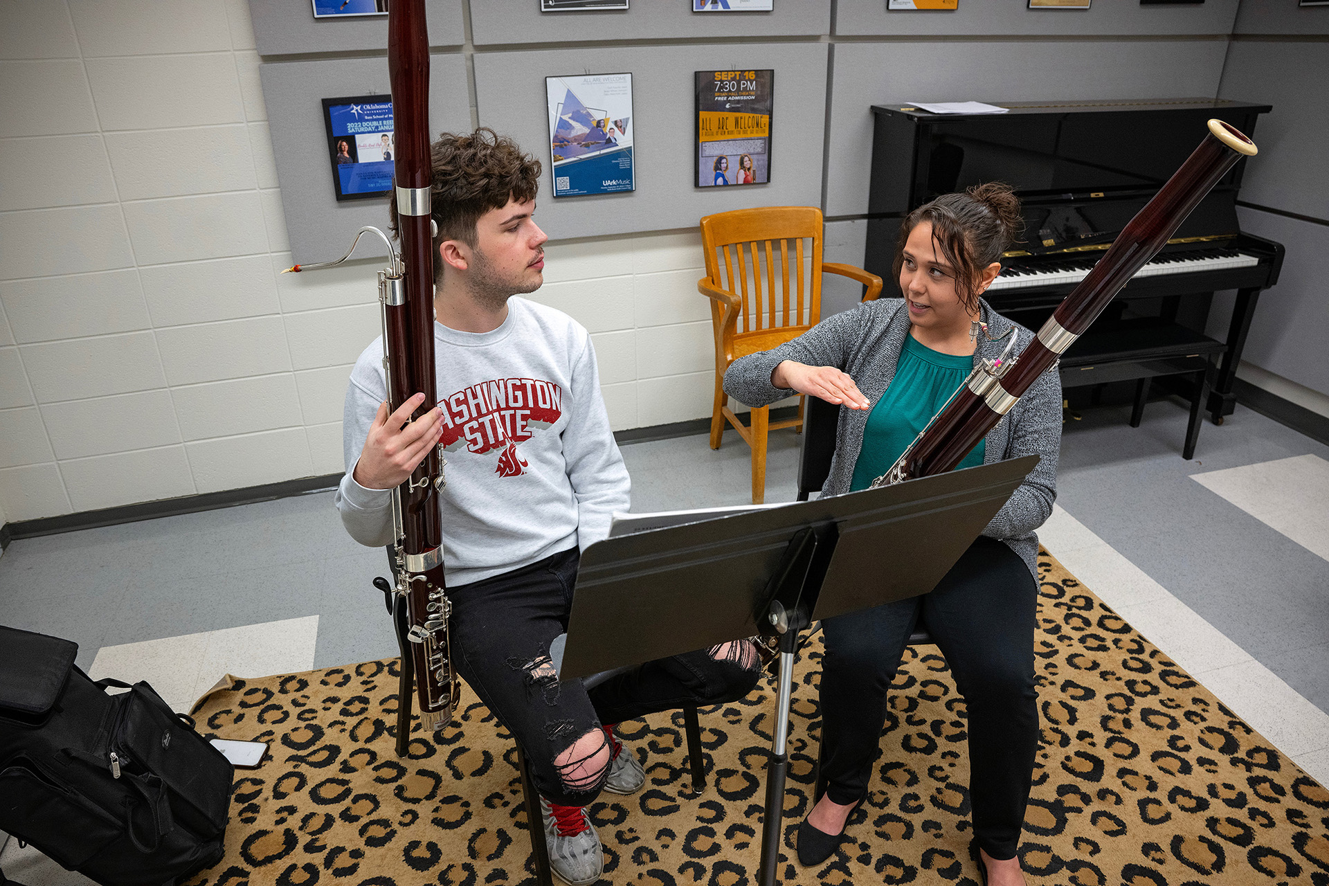 Music professor Jacqueline Wilson-works with a student on Bassoon playing.