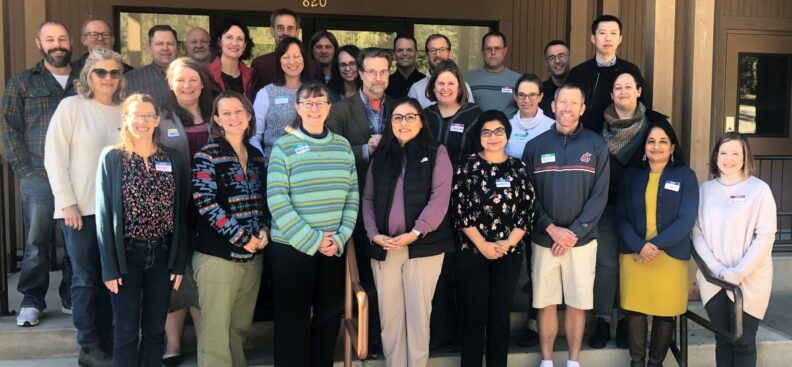 The members of the Provost Leadership Academy's cohort 14 smile and pose as a group.