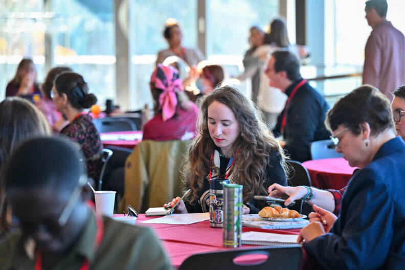 Faculty prepare for a day of networking and professional development at the TEACHxWSU conference.