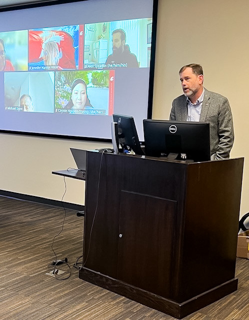 WSU Provost and Executive Vice President T. Chris Riley-Tillman gives remarks from the podium to kick off the WSU Teaching Academy's 2025 member induction ceremony.