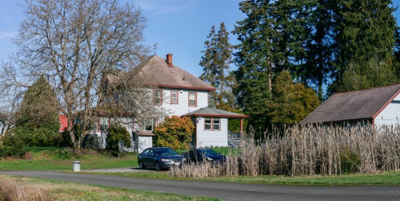 Red and gray Victorian house.