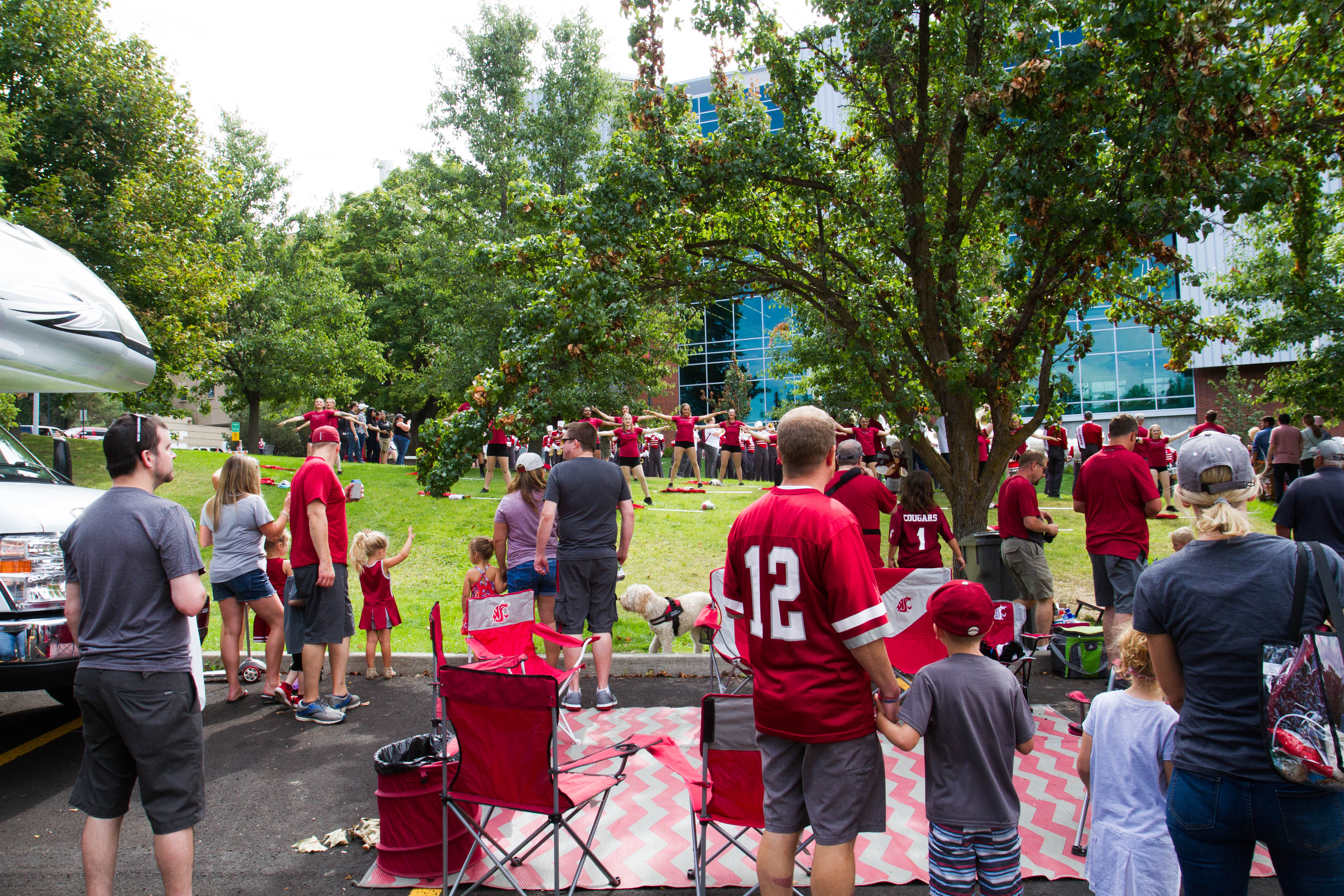 WSU fans watch cheerleaders at UNC tailgate.