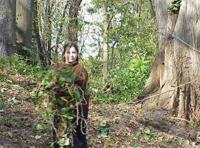 Clearing ivy from the site.