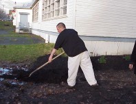 Building planting berms out of topsoil.