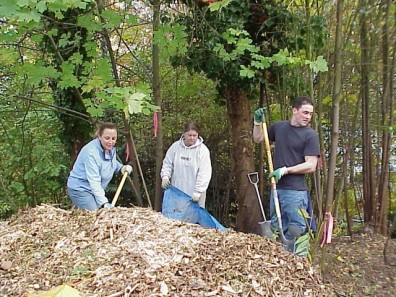 Loading wood chips to spread throughout the site.